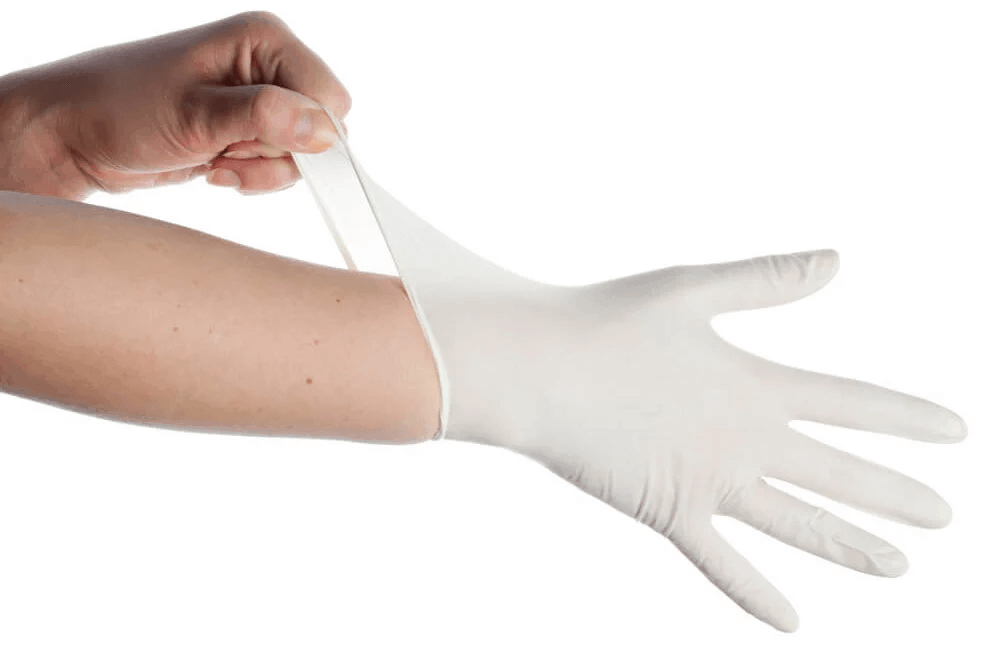 Hand In Latex Glove